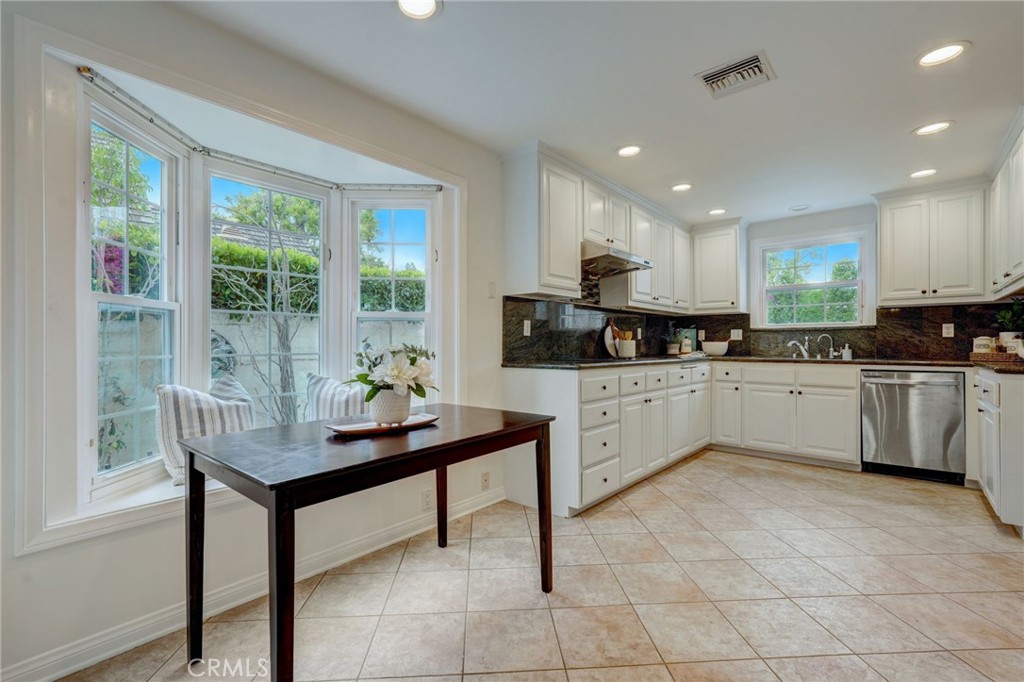 319 Longden Drive San Gabriel, CA 91775 - Photo 17 of 39 a kitchen with a sink cabinets and window