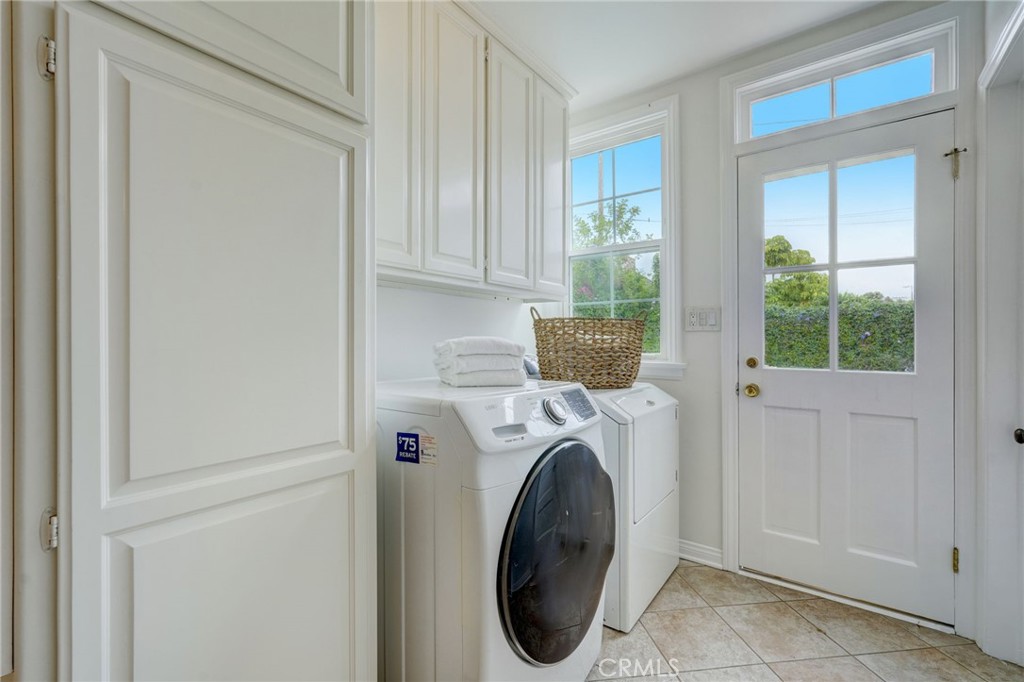319 Longden Drive San Gabriel, CA 91775 - Photo 18 of 39 a utility room with dryer and washer