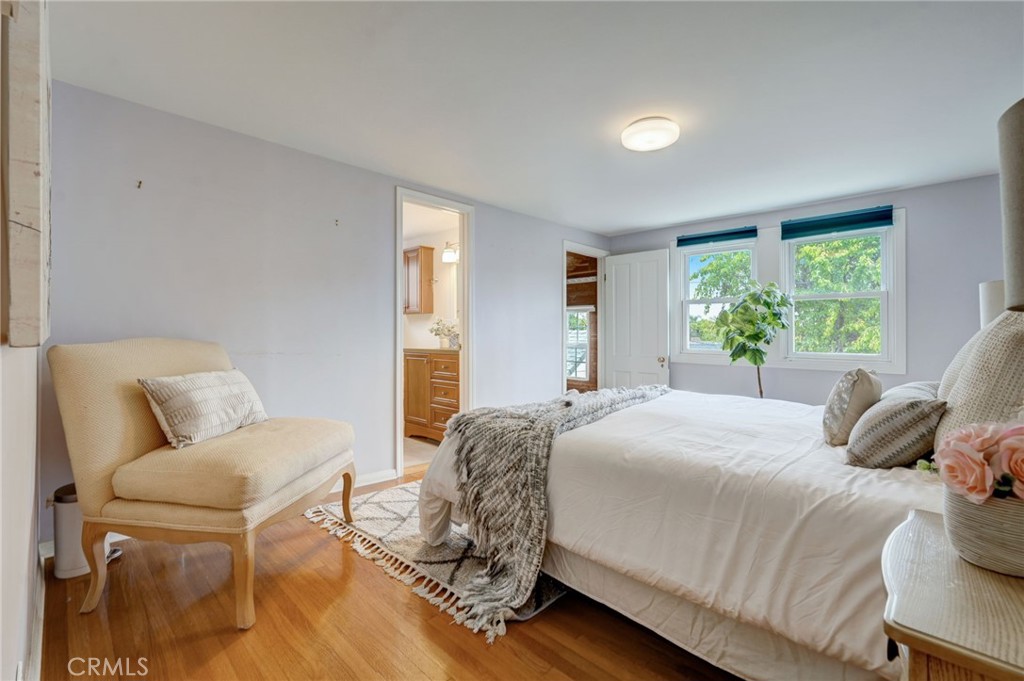 319 Longden Drive San Gabriel, CA 91775 - Photo 23 of 39 a bedroom with a bed and a couch