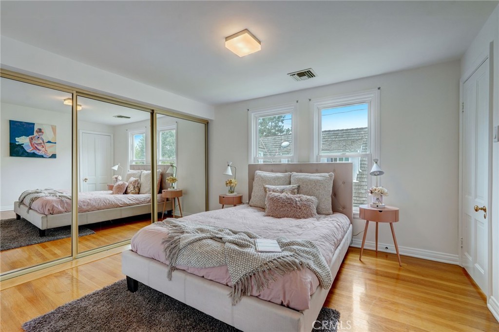 319 Longden Drive San Gabriel, CA 91775 - Photo 29 of 39 a bedroom with a bed and a couch