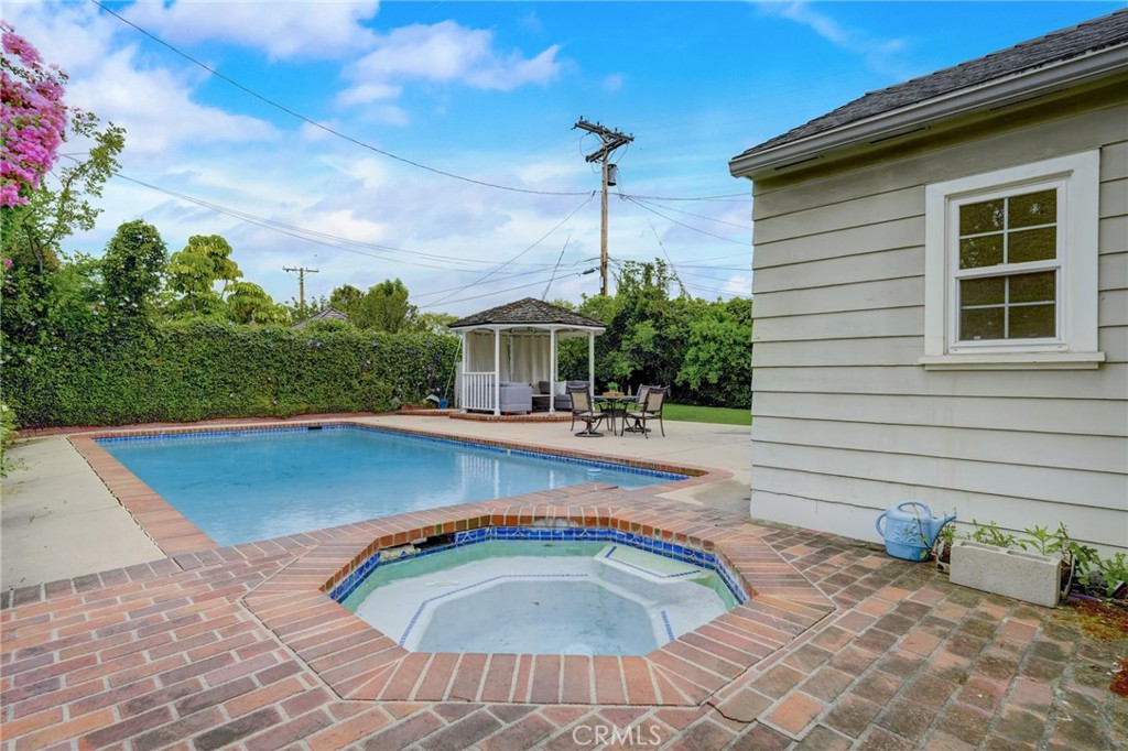 319 Longden Drive San Gabriel, CA 91775 - Photo 35 of 39 a view of a swimming pool with a patio