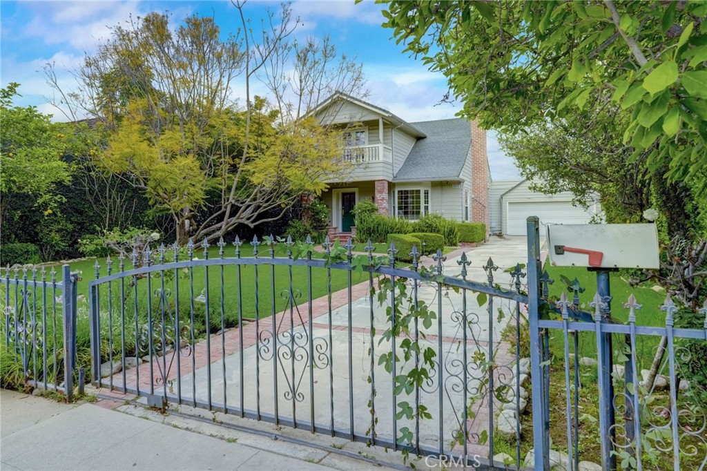 319 Longden Drive San Gabriel, CA 91775 - Photo 38 of 39 a view of a brick house with a small yard and plants