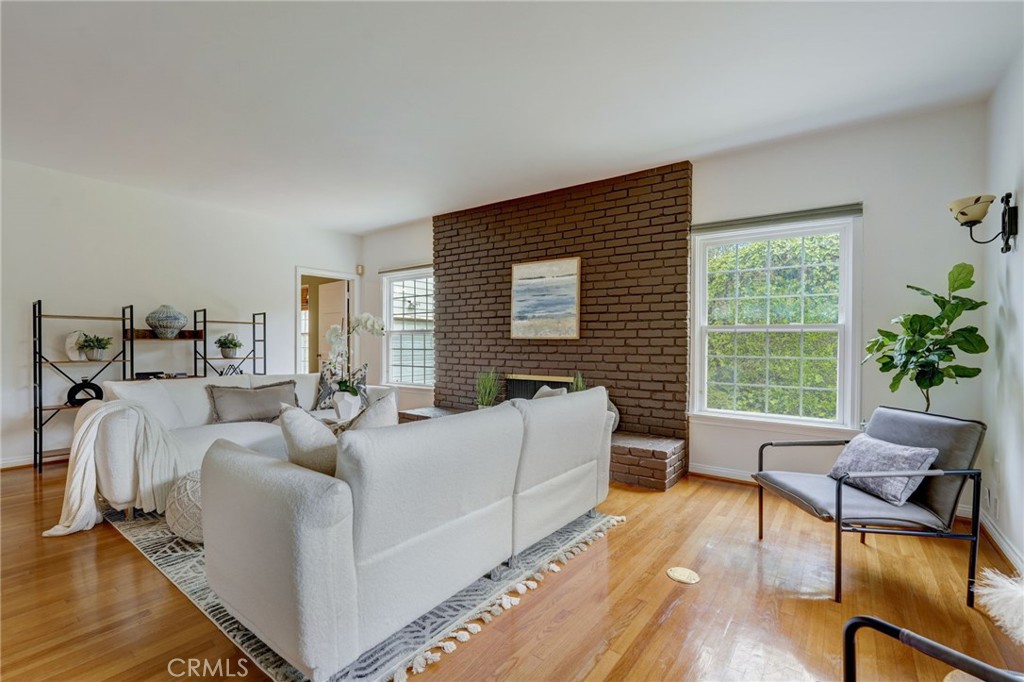 319 Longden Drive San Gabriel, CA 91775 - Photo 5 of 39 a living room with furniture and a window