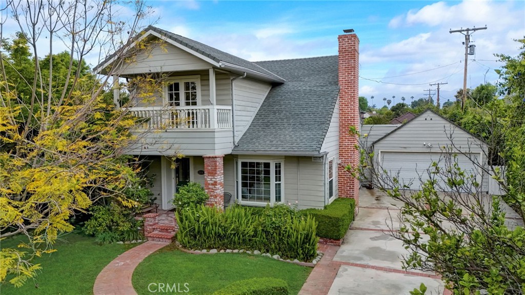 319 Longden Drive San Gabriel, CA 91775 - Photo 7 of 39 a front view of a house with garden