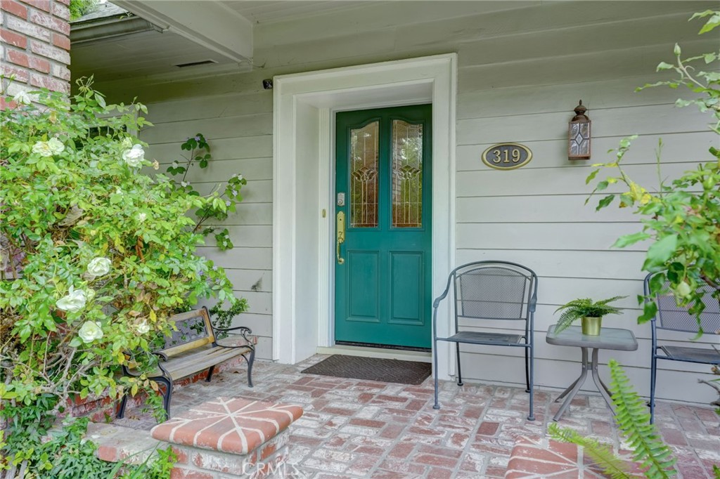 319 Longden Drive San Gabriel, CA 91775 - Photo 8 of 39 a backyard of a house with outdoor seating