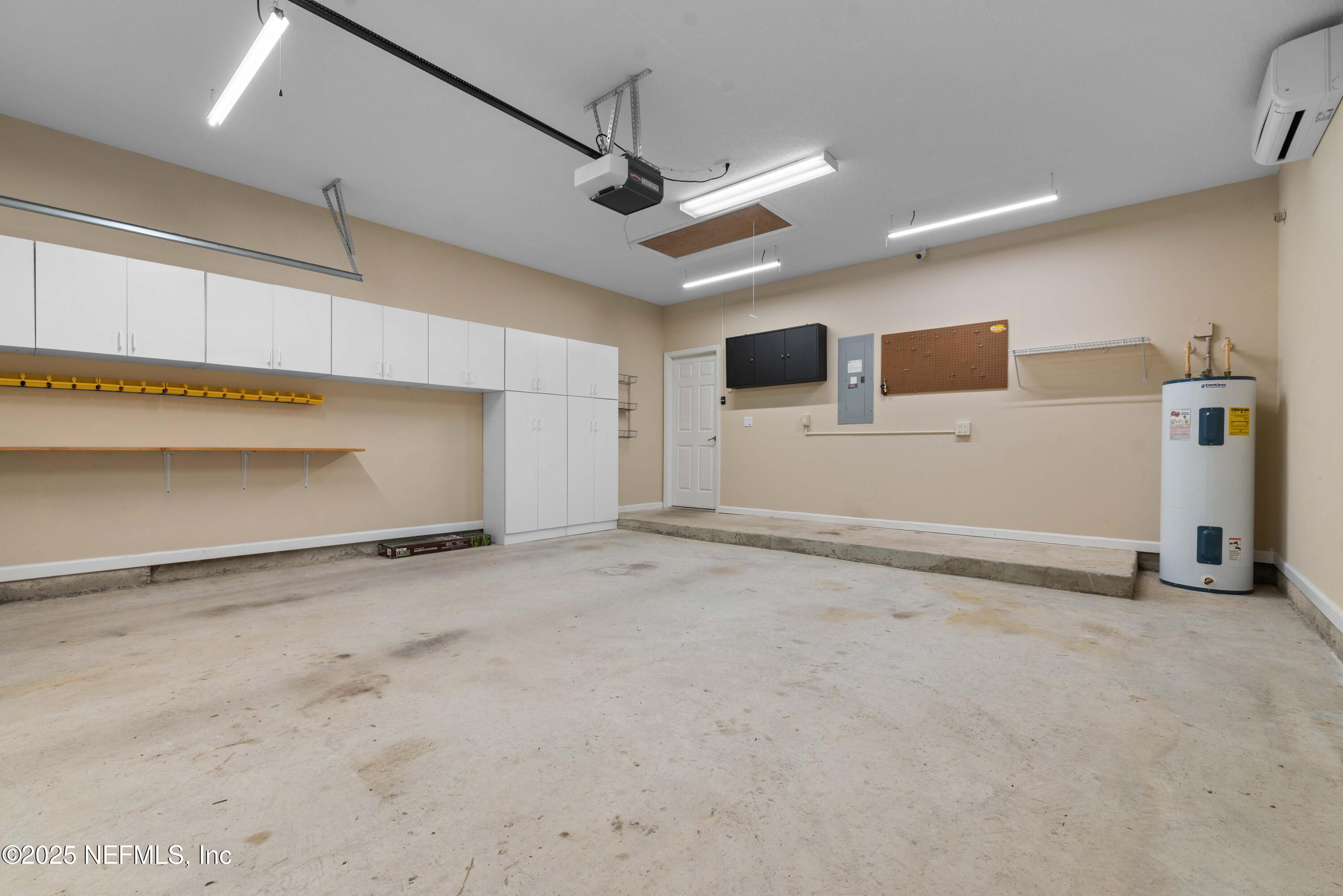 11798 Blueberry Lane Macclenny, FL 32063 - Photo 24 of 30 a view of a livingroom with a projector