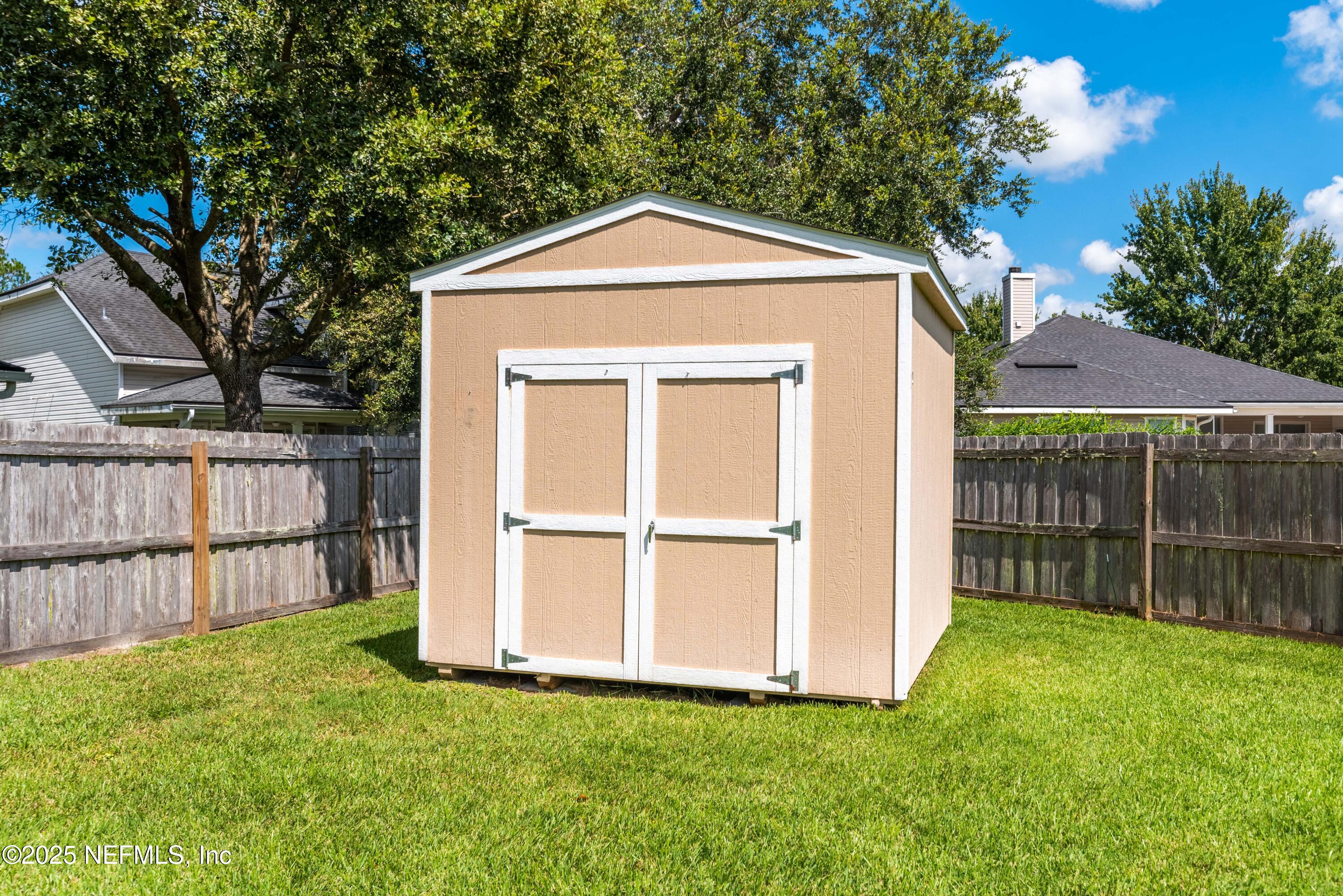 11798 Blueberry Lane Macclenny, FL 32063 - Photo 29 of 30 a front view of a house with a yard