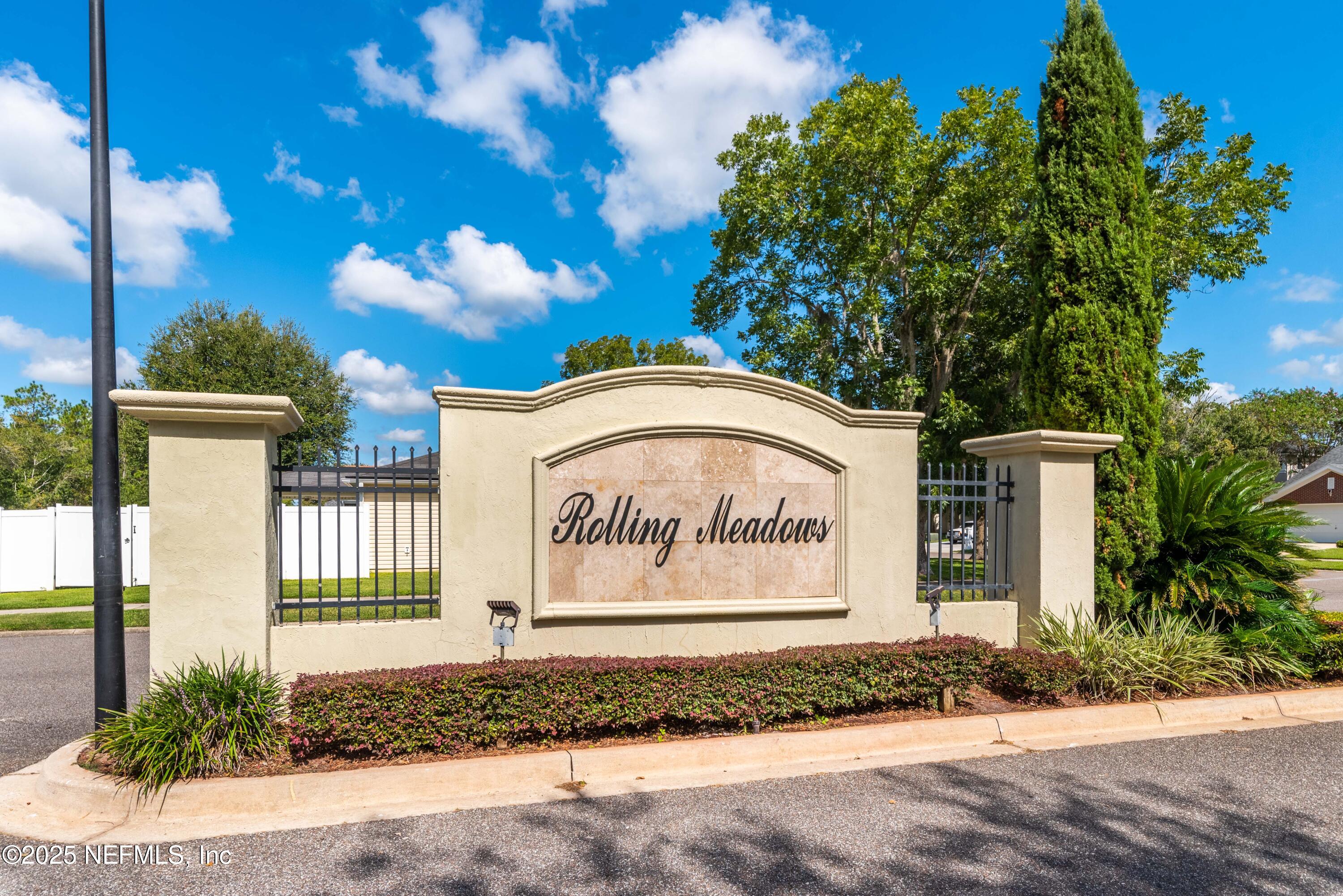 11798 Blueberry Lane Macclenny, FL 32063 - Photo 3 of 30 a sign on the side of a building