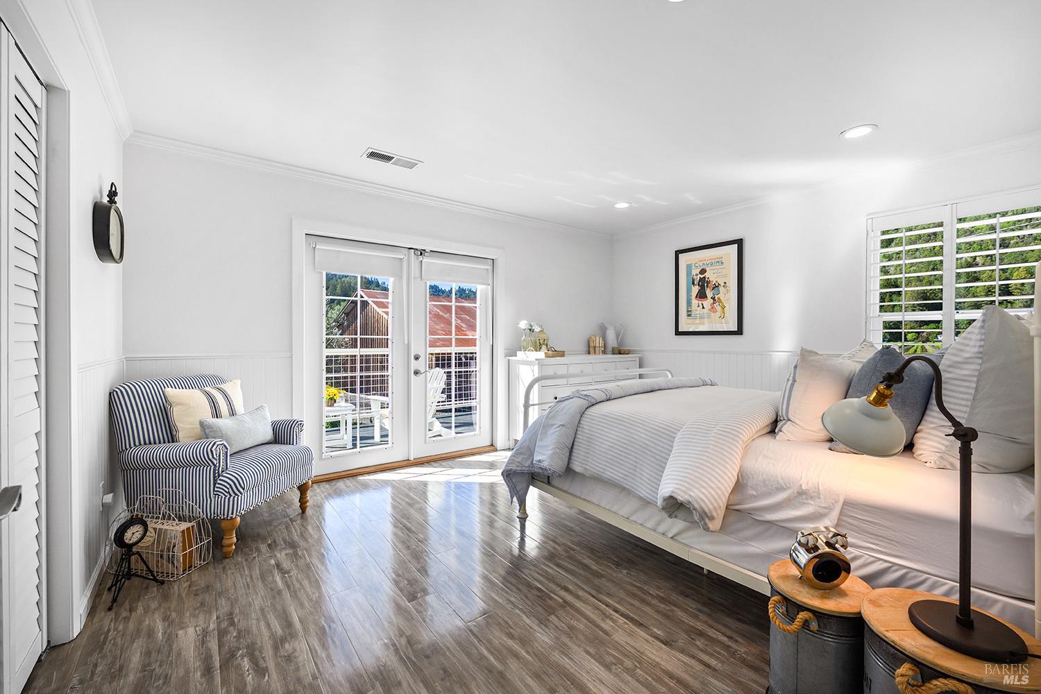 16530 Laughlin Road Guerneville, CA 95446 - Photo 19 of 57 Primary bedroom downstairs has a private deck overlooking the vineyards