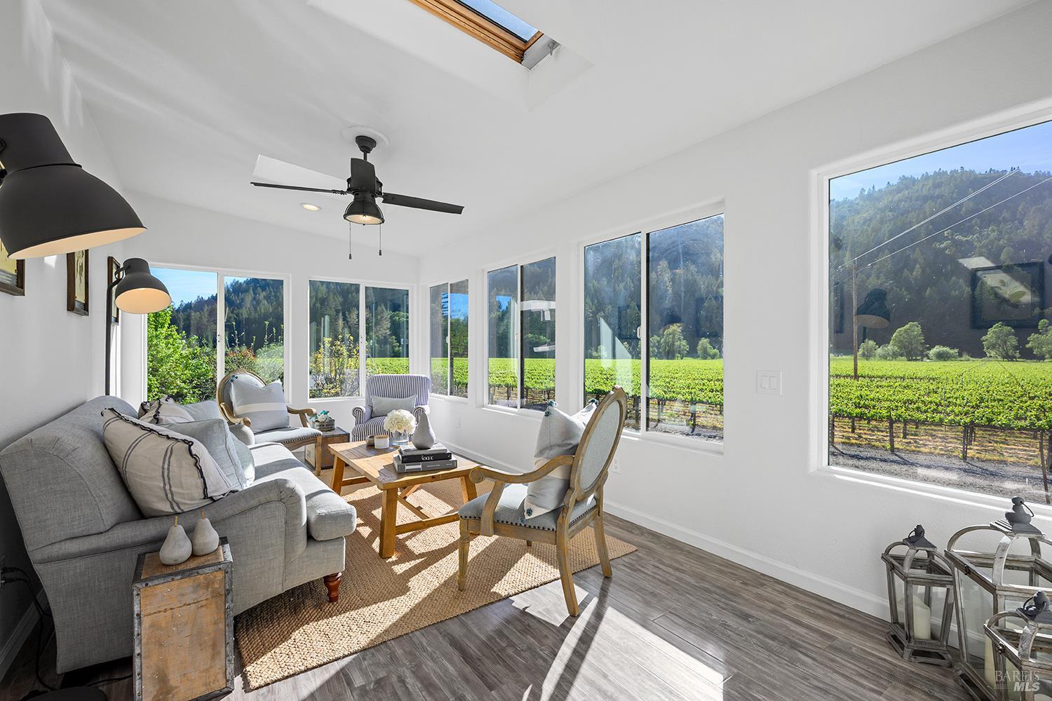 16530 Laughlin Road Guerneville, CA 95446 - Photo 4 of 57 Warm sitting room with stunning vineyard and mountain views