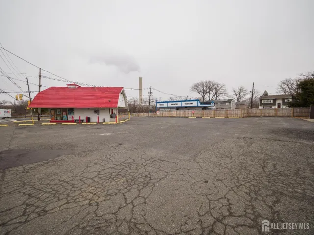 a front view of a house with small garden