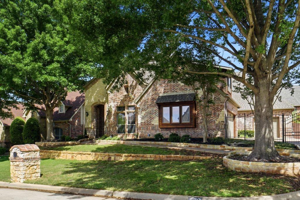 620 Highview Lane Hurst, TX 76054 - Photo 2 of 40 a front view of a house with a yard