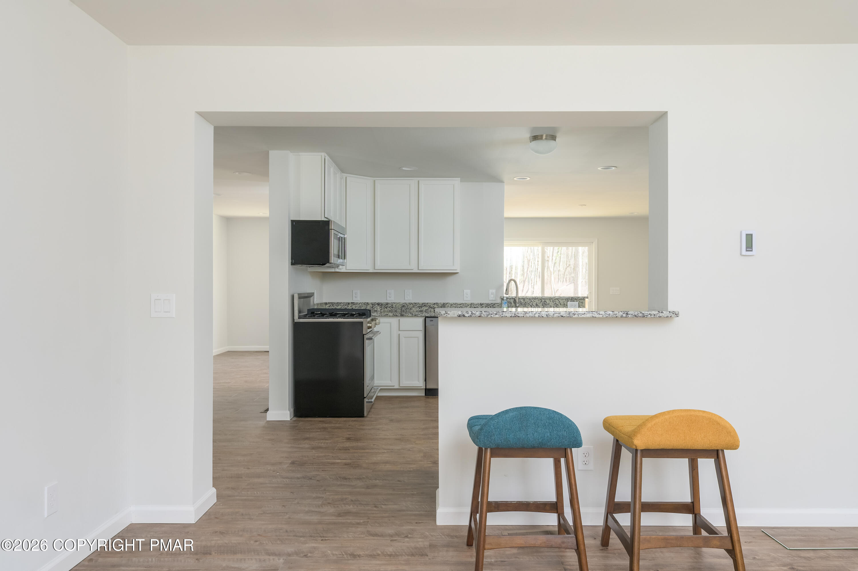 456 Big Oak Road Canadensis, PA 18325 - Photo 12 of 20 a kitchen with stainless steel appliances granite countertop a stove top oven a sink and dishwasher