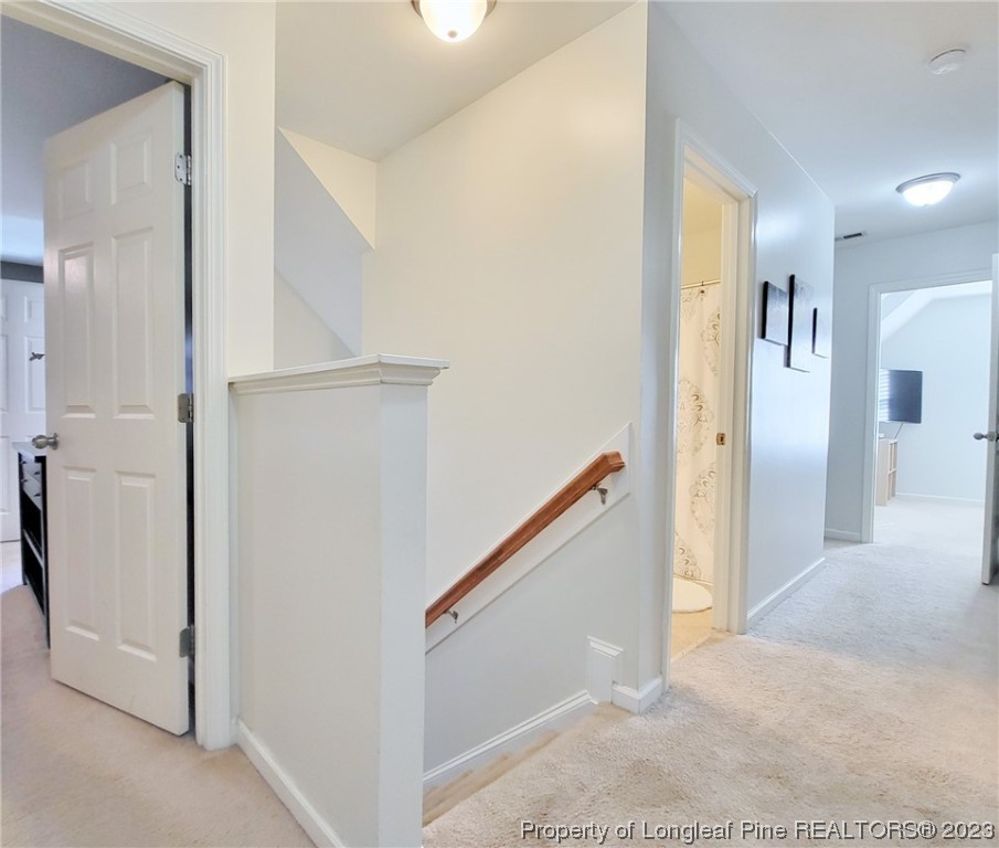 30 Bicentennial Way Cameron, NC 28326 - Photo 18 of 42 a view of a hallway with hallway and stairs