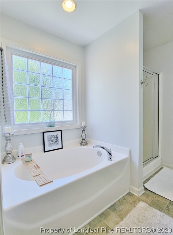30 Bicentennial Way Cameron, NC 28326 - Photo 24 of 42 a bathroom with a bathtub and a sink