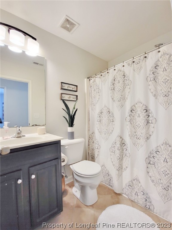 30 Bicentennial Way Cameron, NC 28326 - Photo 28 of 42 a bathroom with a toilet sink and mirror