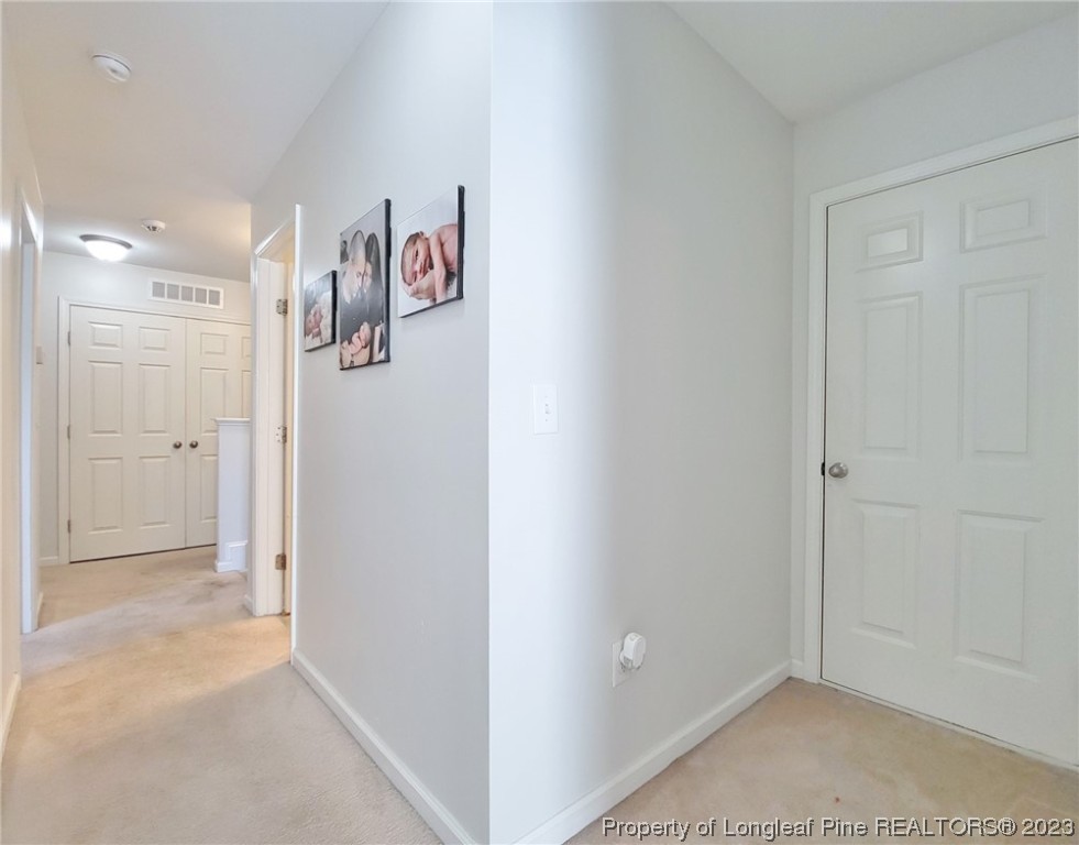 30 Bicentennial Way Cameron, NC 28326 - Photo 31 of 42 wooden floor in an empty room