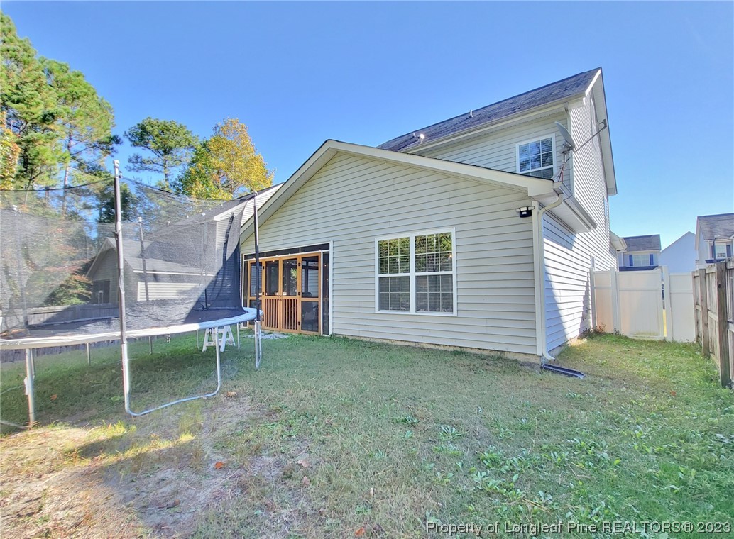 30 Bicentennial Way Cameron, NC 28326 - Photo 41 of 42 a view of a house with a yard and sitting area