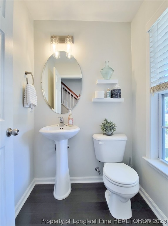 30 Bicentennial Way Cameron, NC 28326 - Photo 6 of 42 a bathroom with a toilet sink and mirror