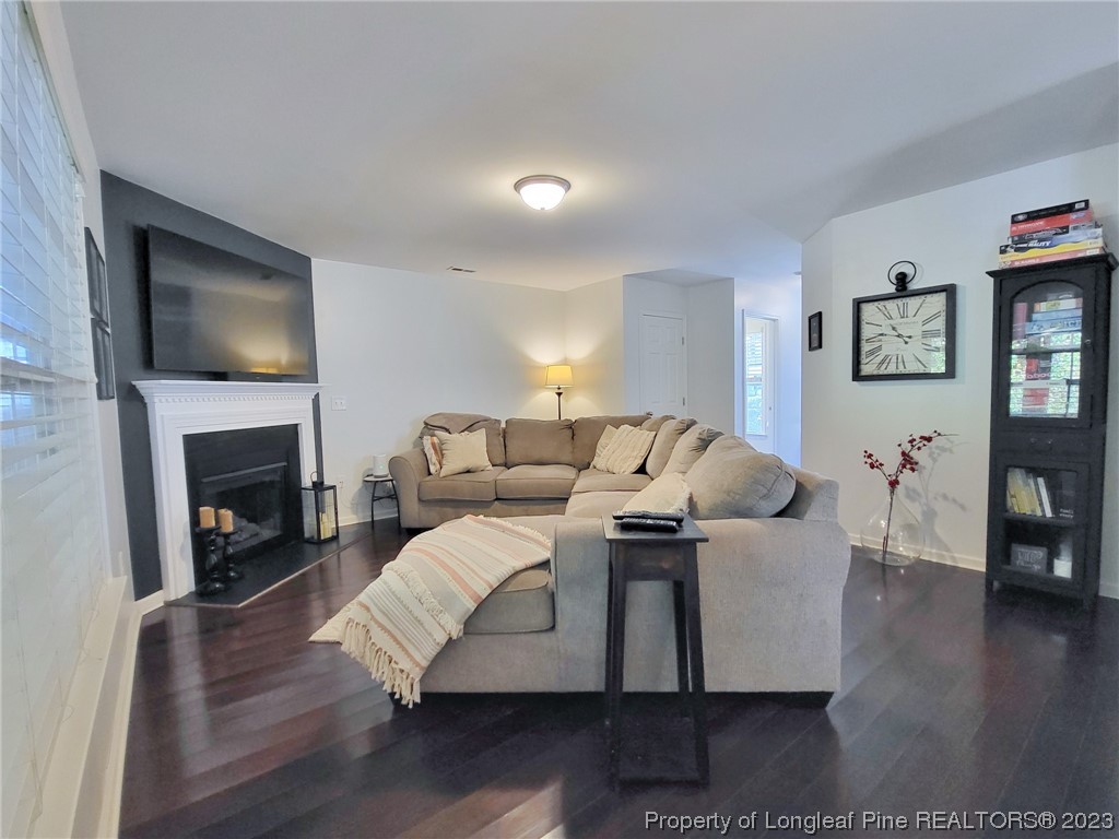 30 Bicentennial Way Cameron, NC 28326 - Photo 7 of 42 a living room with furniture fireplace and flat screen tv