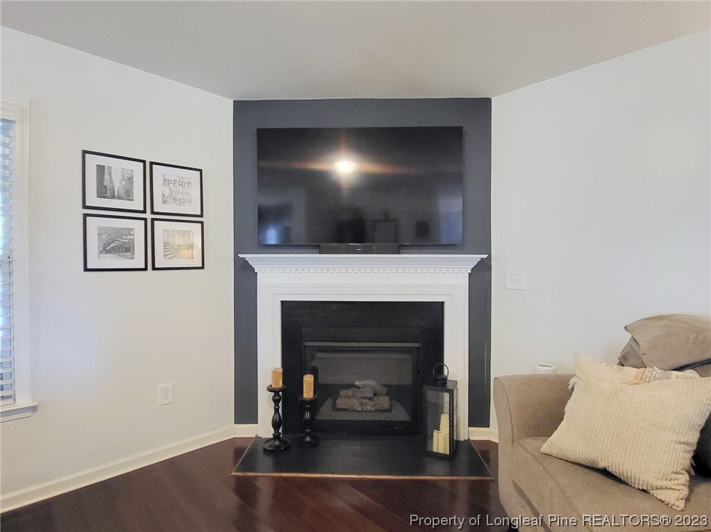 30 Bicentennial Way Cameron, NC 28326 - Photo 9 of 42 a living room with furniture and a fireplace