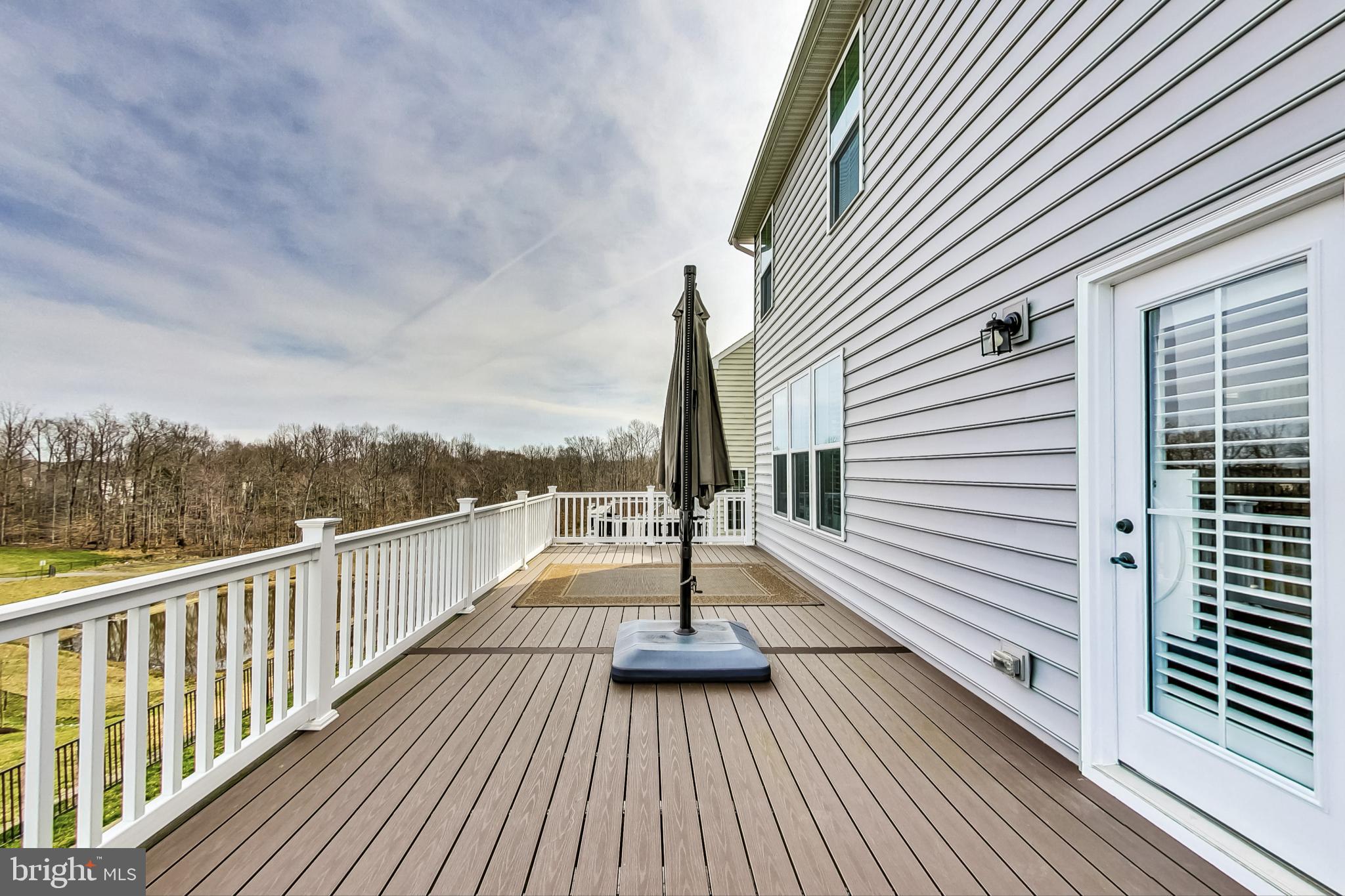 4513 Cotswold Manor Loop Woodbridge, VA 22192 - Photo 24 of 73 Composite deck runs the width of the house