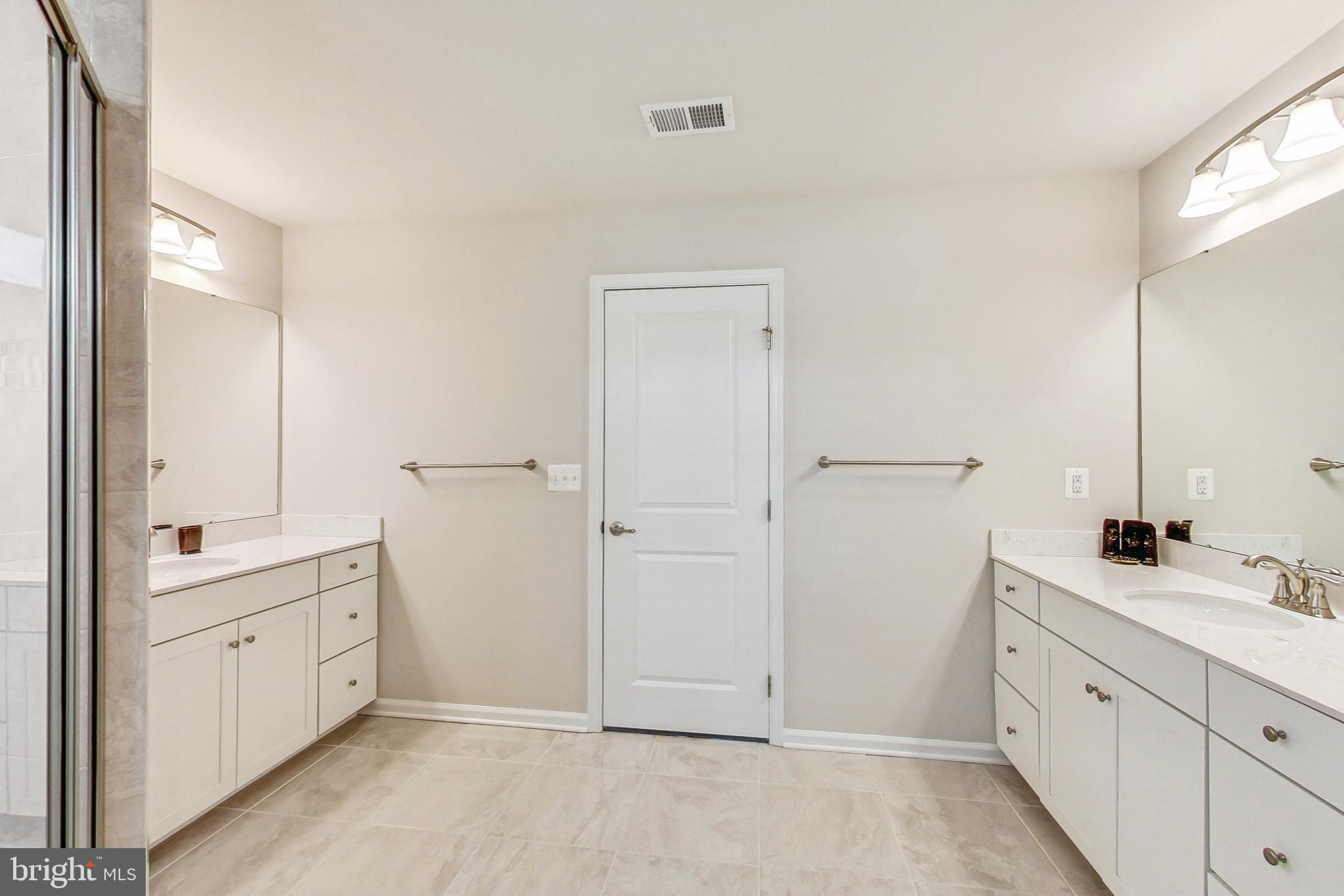 4513 Cotswold Manor Loop Woodbridge, VA 22192 - Photo 32 of 73 Primary BA: Dual vanities & ceramic tile