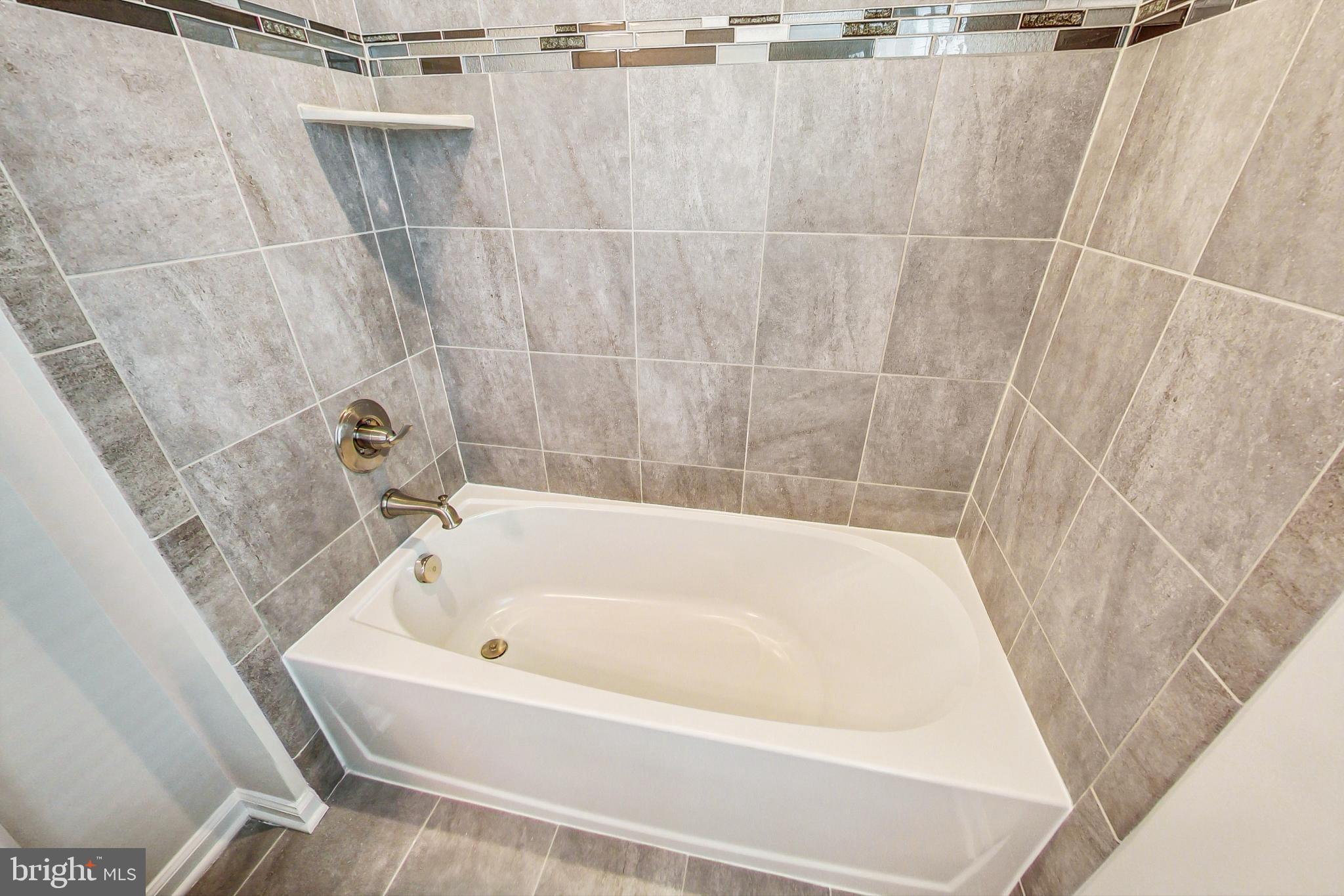 4513 Cotswold Manor Loop Woodbridge, VA 22192 - Photo 39 of 73 BR2 BA: Ceramic tile floor & shower walls