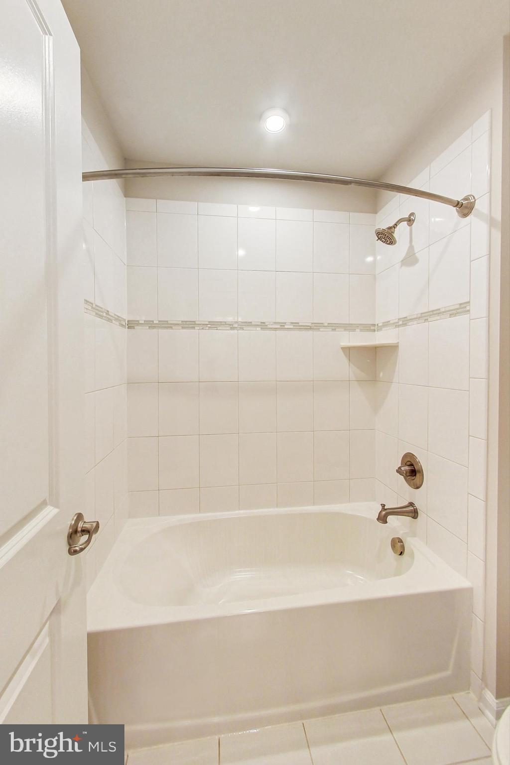 4513 Cotswold Manor Loop Woodbridge, VA 22192 - Photo 46 of 73 JnJ bathroom's separate tub/shower & toilet room