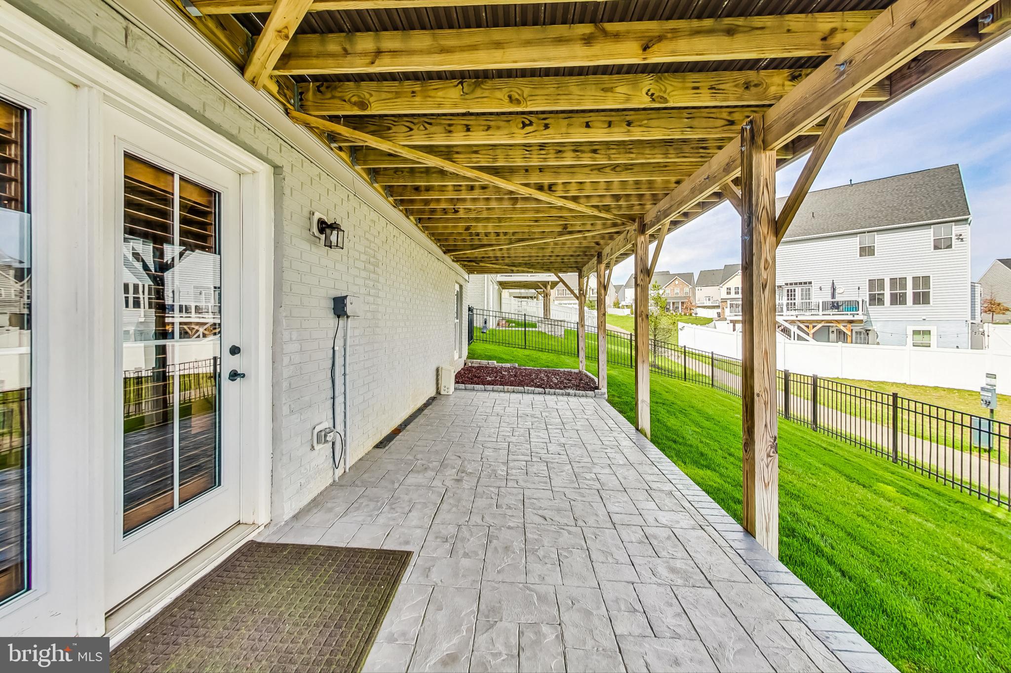 4513 Cotswold Manor Loop Woodbridge, VA 22192 - Photo 67 of 73 House-width stamped-concrete patio