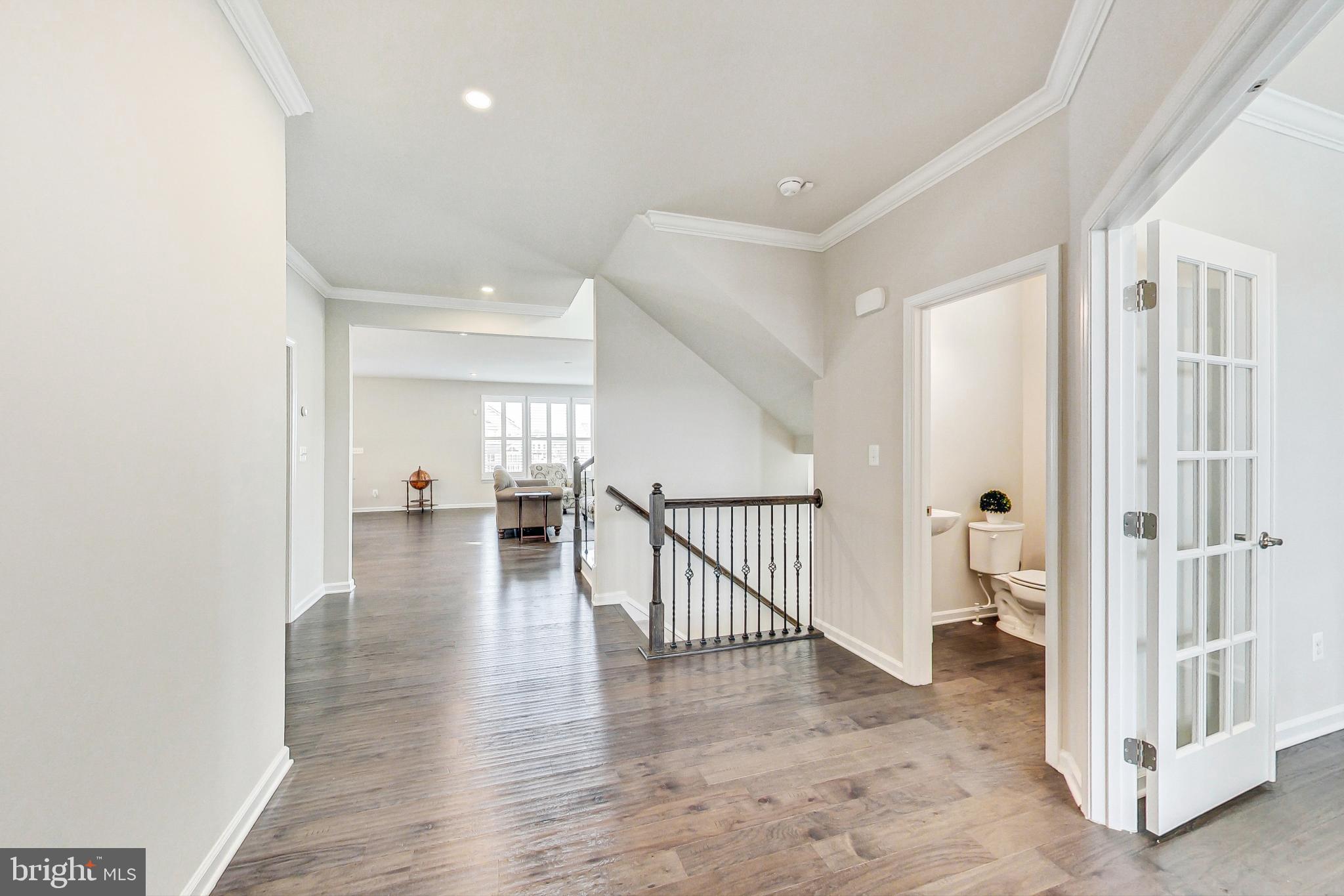 4513 Cotswold Manor Loop Woodbridge, VA 22192 - Photo 8 of 73 Extended foyer to office/BA/mudrm/kit/DR