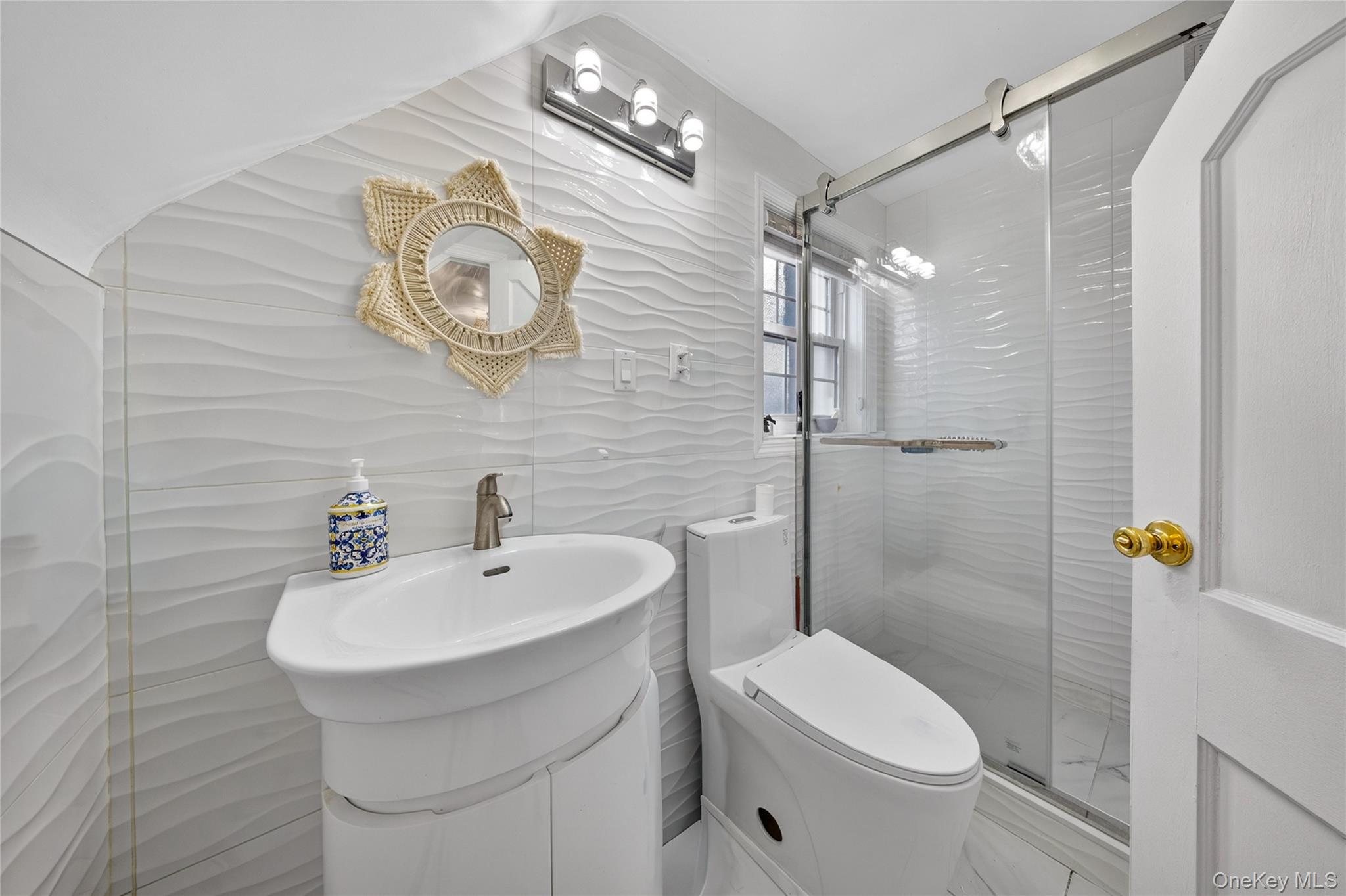 16 Ascot Ridge Great Neck, NY 11021 - Photo 20 of 33 a bathroom with a sink a toilet and shower