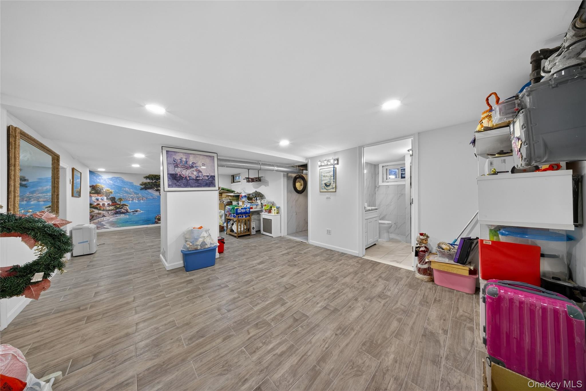 16 Ascot Ridge Great Neck, NY 11021 - Photo 23 of 33 a living room with furniture and a wooden floor
