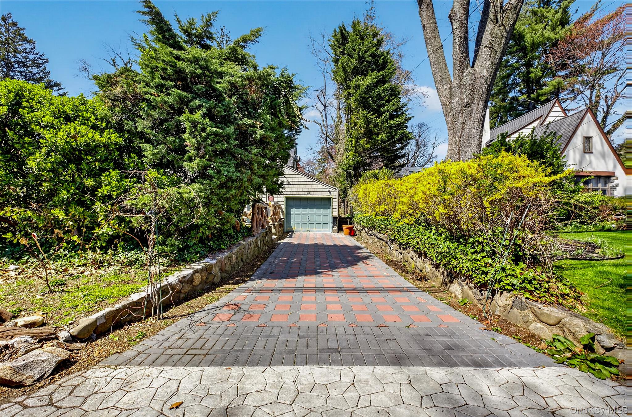 16 Ascot Ridge Great Neck, NY 11021 - Photo 27 of 33 a view of house with yard
