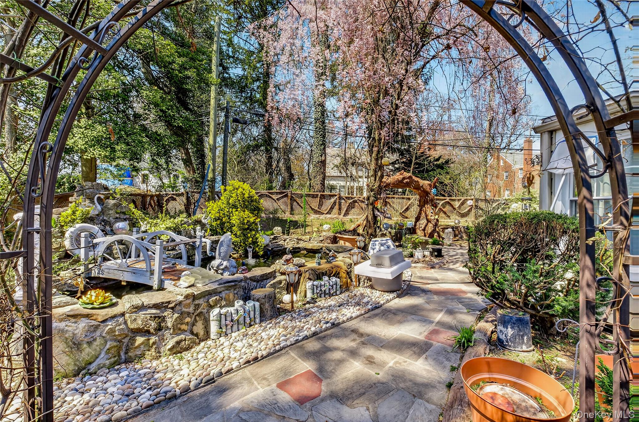 16 Ascot Ridge Great Neck, NY 11021 - Photo 28 of 33 a view of outdoor space with garden
