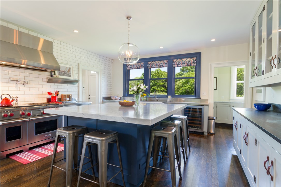 601 Beavertail Road Jamestown, RI 02835 - Photo 12 of 44 Stunning chef's gourmet kitchen with 42 sq. ft. marble island and state-of-the-art appliances