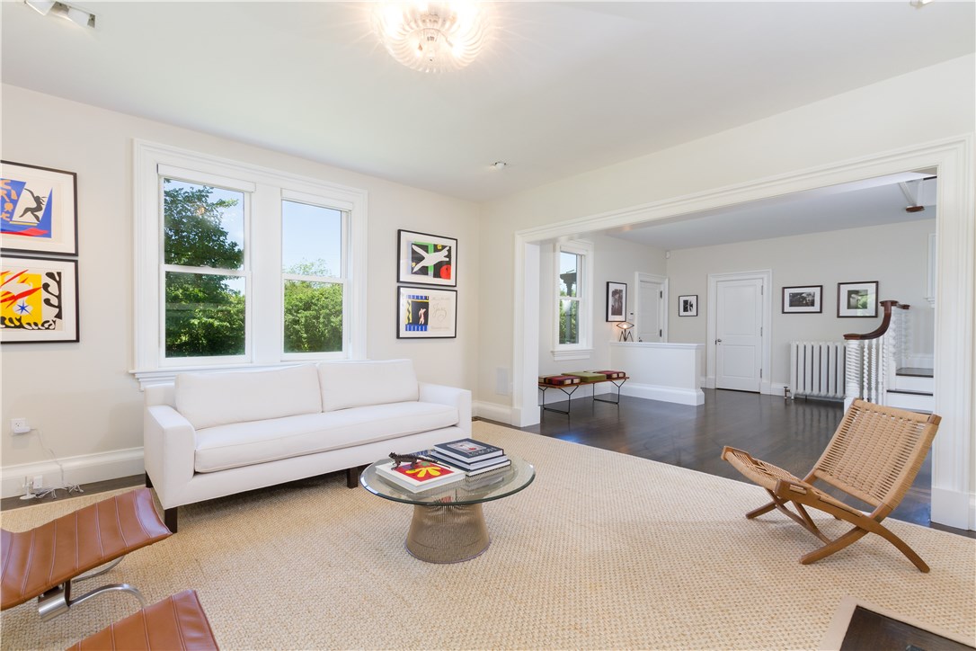 601 Beavertail Road Jamestown, RI 02835 - Photo 9 of 44 Open flow foyer & living room with fireplace and sophisticated gallery lighting