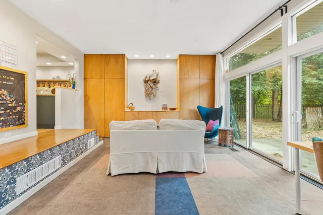 a bed room with a bed and a couch