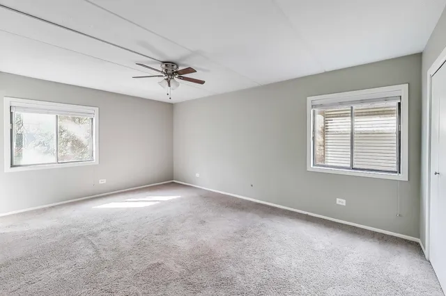 a bathroom with a sink mirror toilet and bathtub