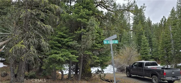 a view of a car parked on the side of the road