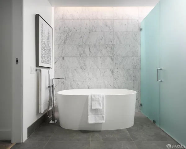 a view of residential houses with outdoor space and lake view