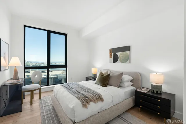 a view of a balcony with an outdoor seating