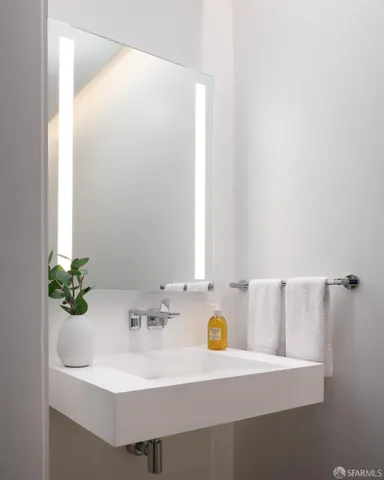 a outdoor space with patio couch and a potted plant