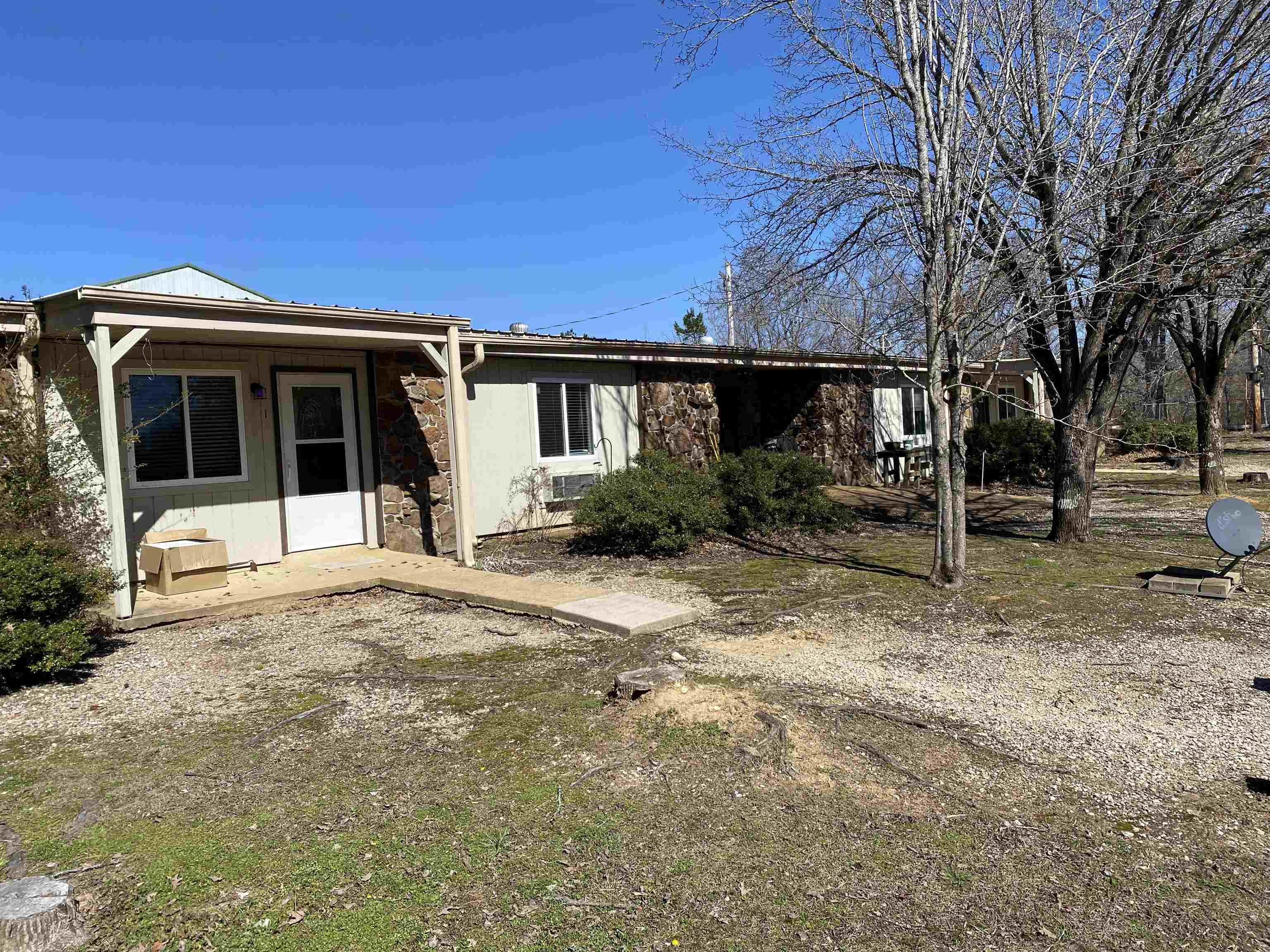 295 Highway 18 Loop Toone, TN 38381 - Photo 3 of 3 a front view of a house with garden