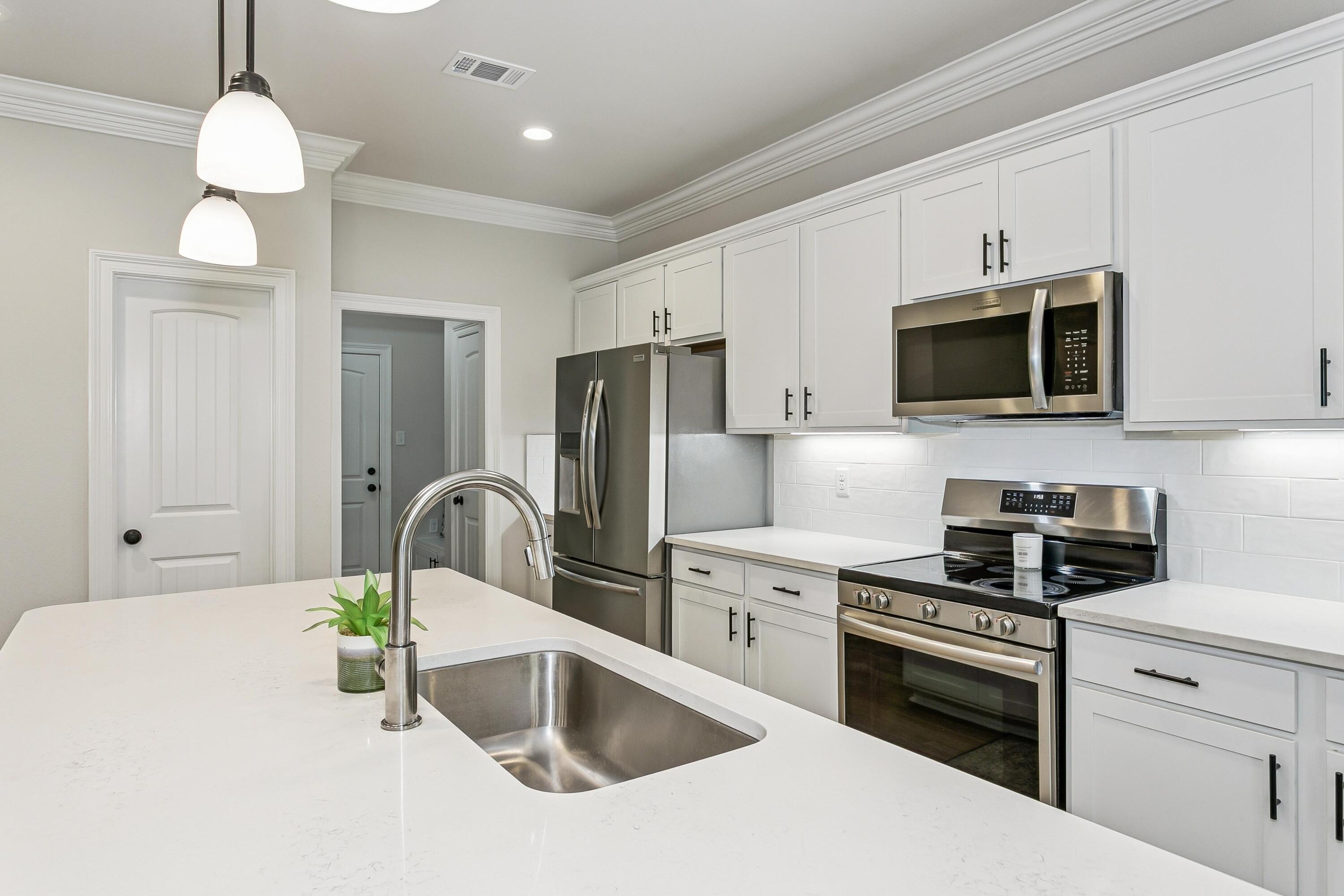 124 Apollo Avenue Freeport, FL 32439 - Photo 11 of 41 Premium Quartz with Striking Veining!