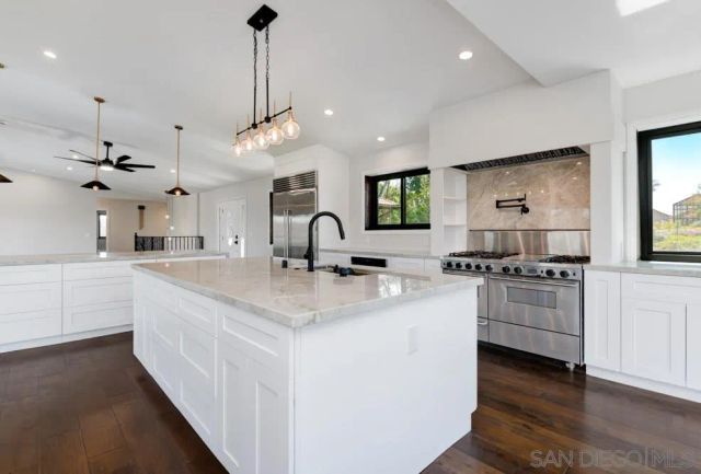 a view of a room with window an outdoor view