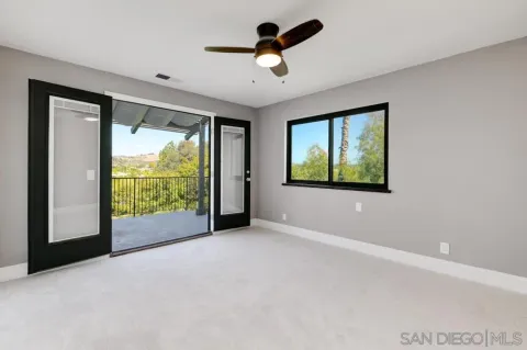 a view of a kitchen with a white kitchen