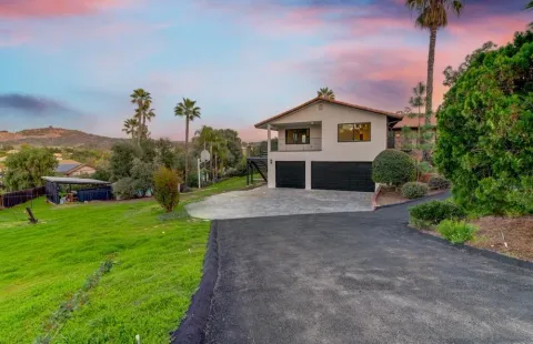 a view of a swimming pool with a garden