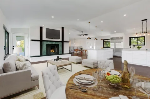 a living room with fireplace furniture and a flat screen tv
