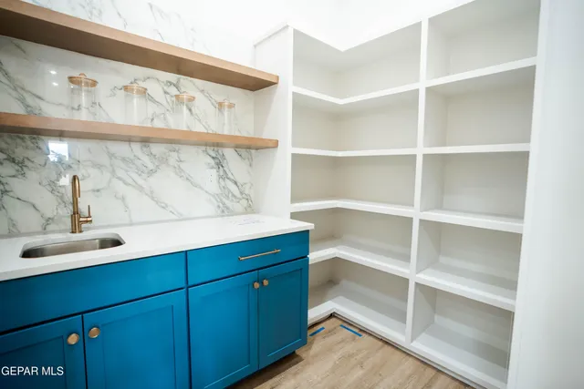 a view of a hallway with closet